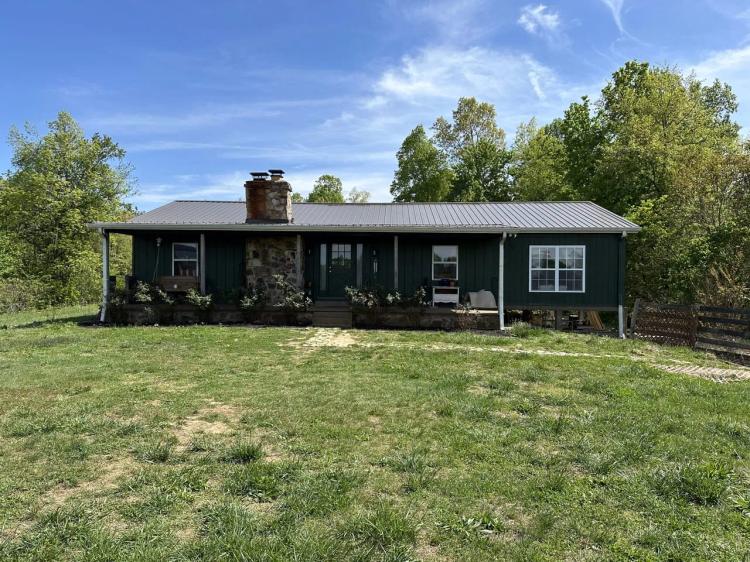 Charming 3-Bedroom Home with full basement. Modern Amenities on 3.66 Acres located in Macon County, Tennessee