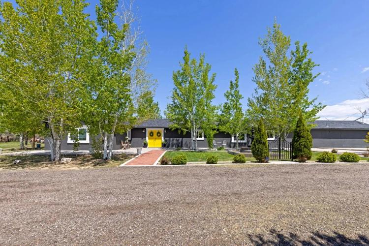 A Northern Colorado home with beautiful views, great land, & an upgraded home! 
