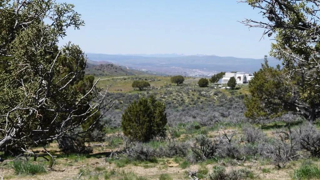 Trees * Views with a small hill * Camp * RV * Build