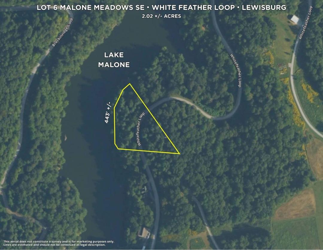 Beautiful Lakefront Building Lot with Metal Building!