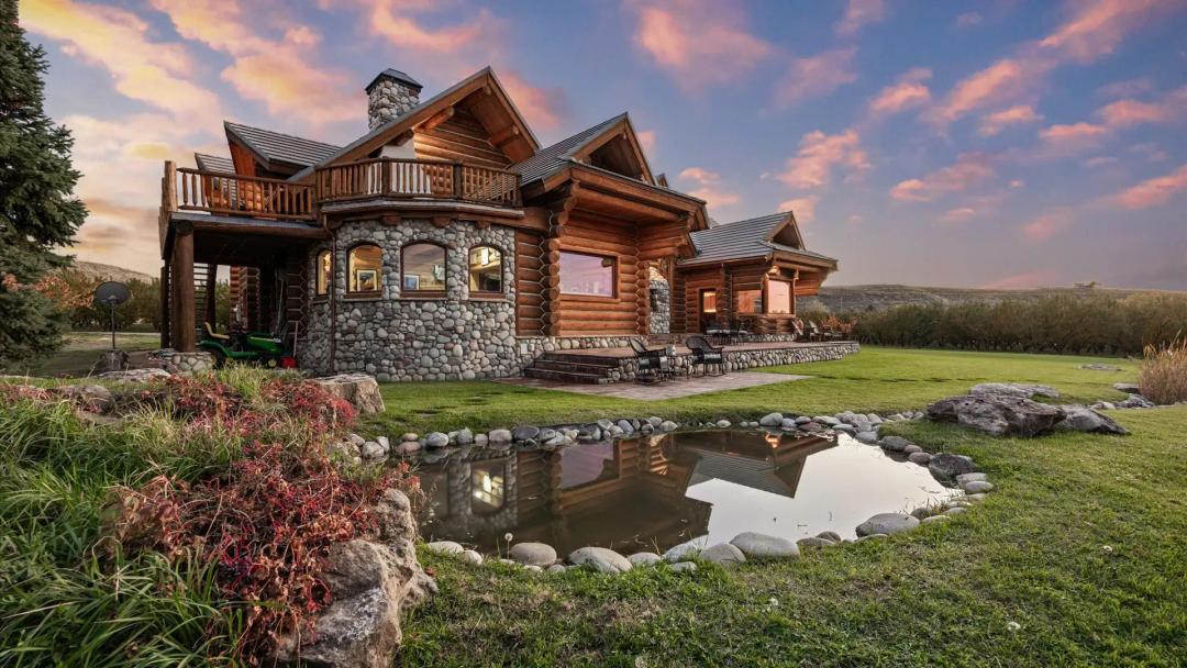 Colorado Log Home and Peach Orchard for sale brokers Michael Krieg and Valerie Siler