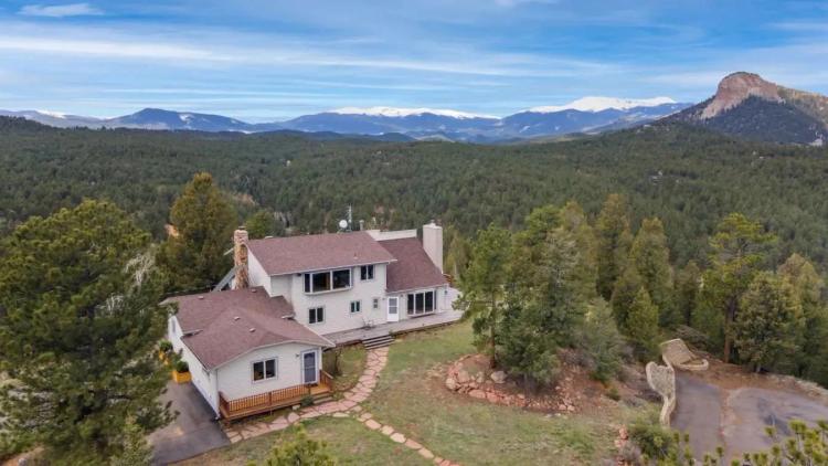 Amazing Estate on 9.31 acres in Pine!