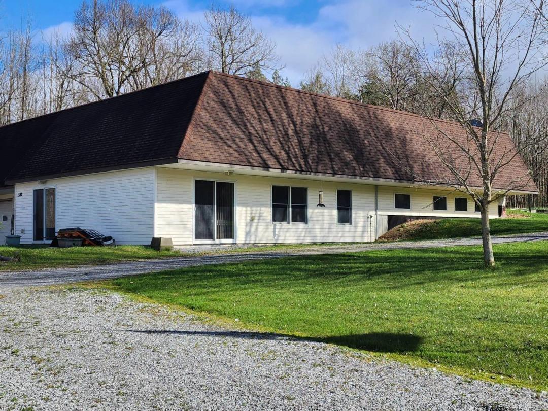 2 Bedroom 2 Bath Home on 38 Acres w/ 2 car garage and large Barn