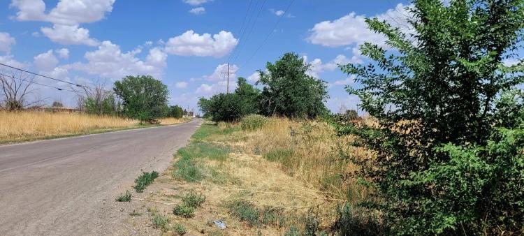 Nearly Two Acres with Paved Road Frontage in West Roswell - Power
