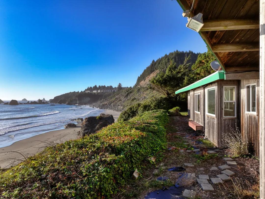 10.6 acres of Oceanfront land with 2400+ SF home