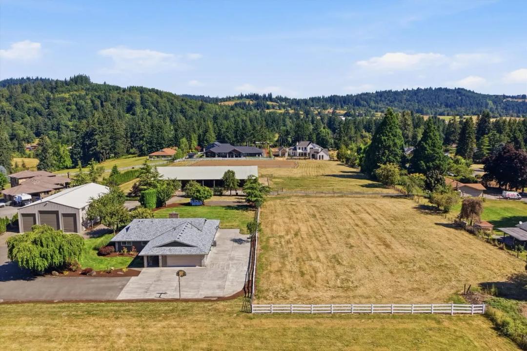 5.5 Divideable Acres with House, Shop, Barn and Arena!