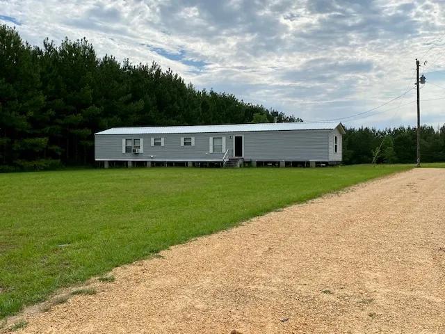 Mobile Home & 65 acres in NPSD