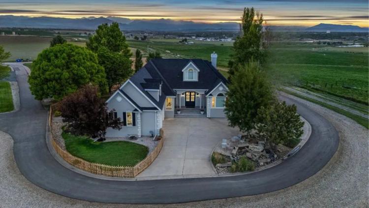 55+ Acres of Snowcapped Views, Two Homes, and Equine