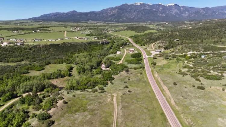  Striking Quarter Acre Buildable Creek Lot in Colorado City with Road Frontage &#038; Power 