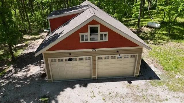 16+ Acres Boat Slip and Garage with Cabin Potential