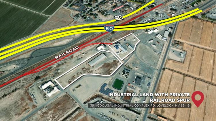 Industrial acreage with warehouses and railroad spur