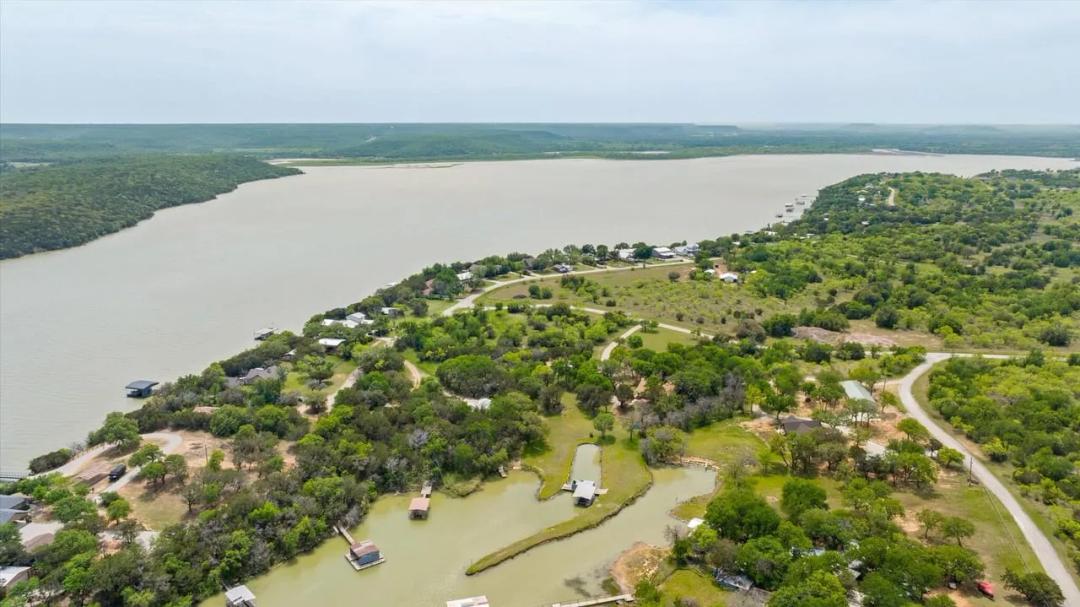 Lakefront Home on Almost 5 Acres With Guest House