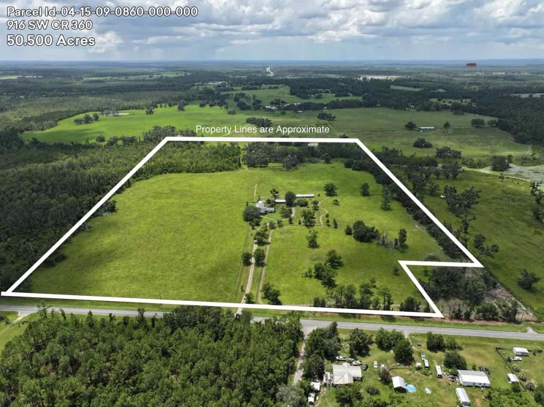 Expansive 50.5-Acre Estate with 4-Bedroom Home & Agricultural Potiental