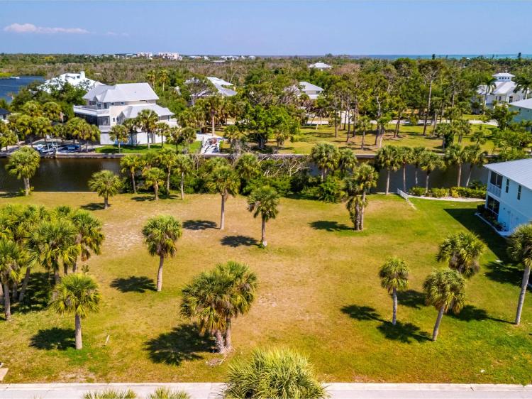 Waterfront Serenity Awaits: Build Your Dream Home on this Prime Placida Pointe Lot