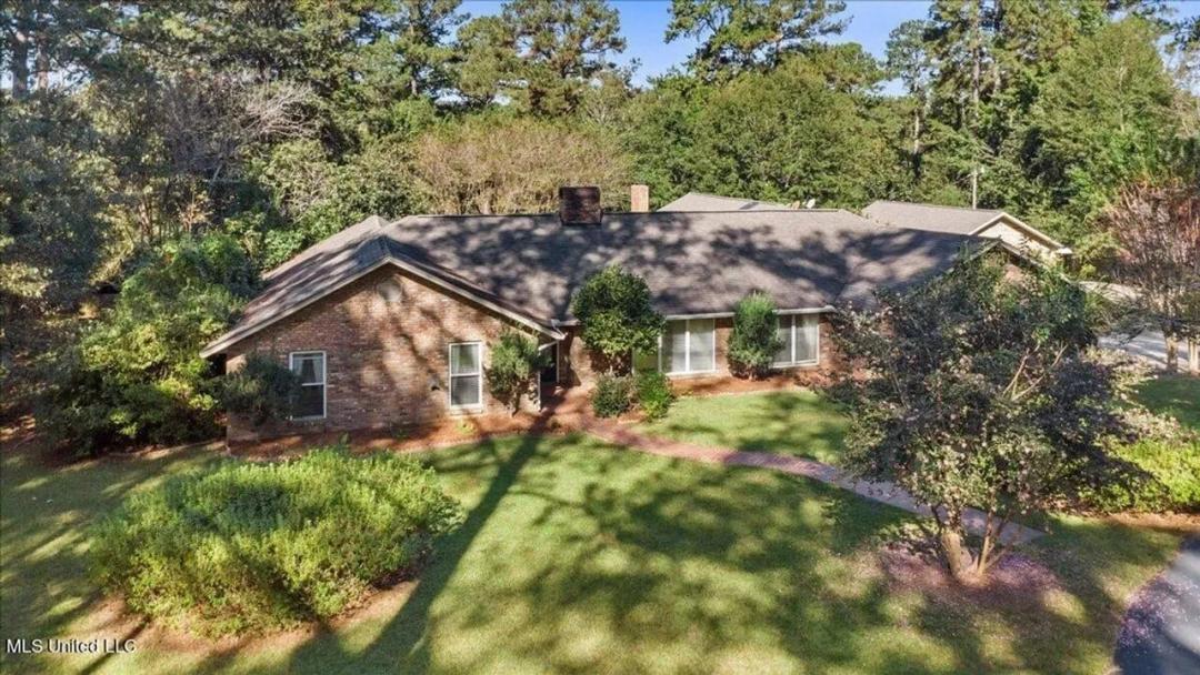 Executive Brick Home with Pool and Lake in McComb