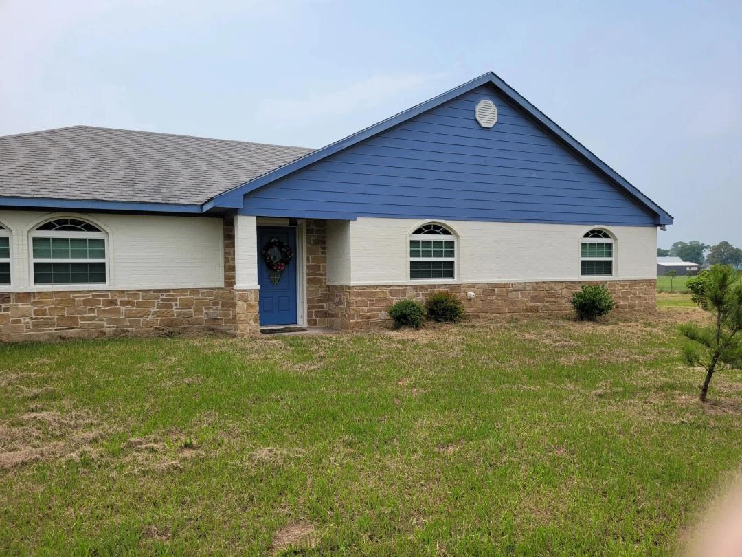 Homestead-Ready: Country Home with Pond & Acreage