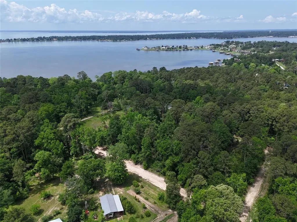 Affordable 0.43 Acre Triple Lot in Livingston, TX – Mobile Homes Allowed – Peaceful Wooded Setting