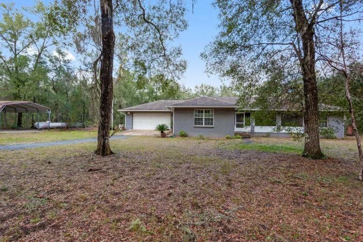 Home on nearly 2 acres across from Hall Lake {H-626}