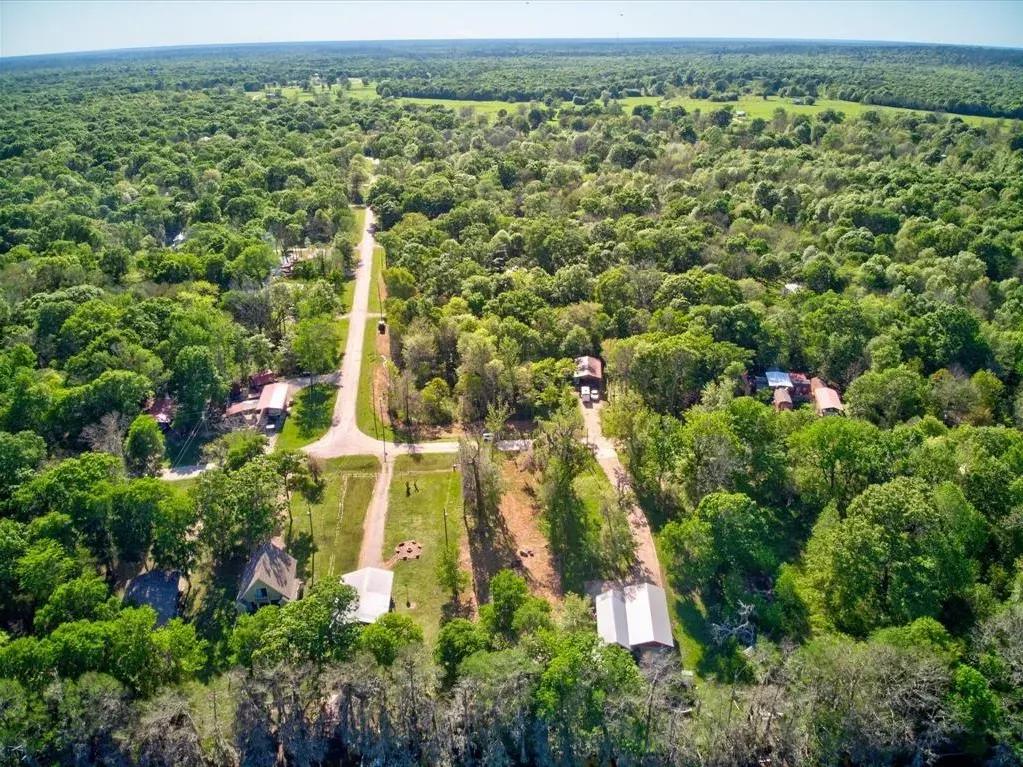 Wooded Lot in Cypress Lakes, Cleveland TX with Road Access – Great for Weekend Retreat