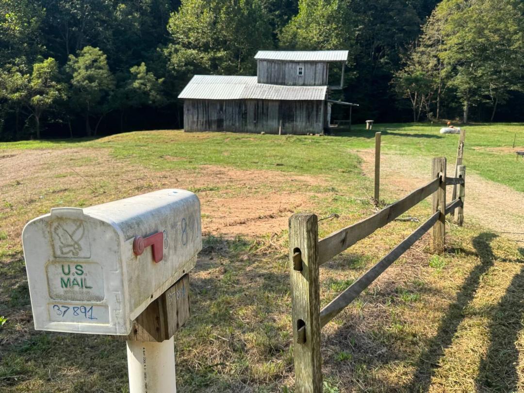 Secluded 3.5 Acres with Creek, Barn & Living Quarters