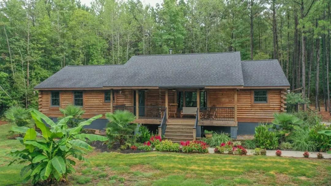 A True Outdoor Retreat with 29.9 Acres, Log Cabin Charm, Fishing & Hunting — Just Outside Henderson