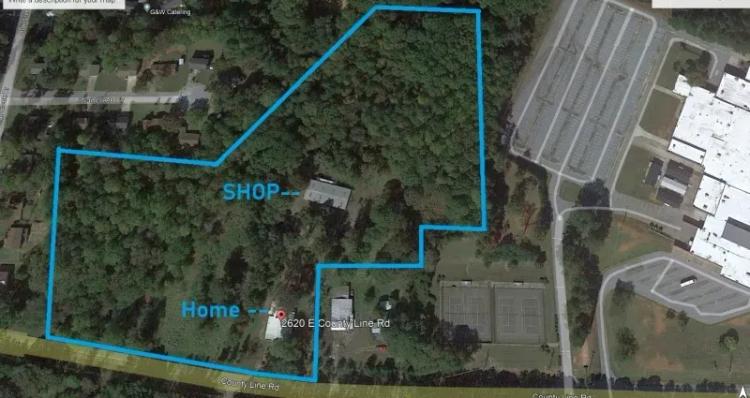 11 +/- Acres with home, shop building and partially enclosed shed