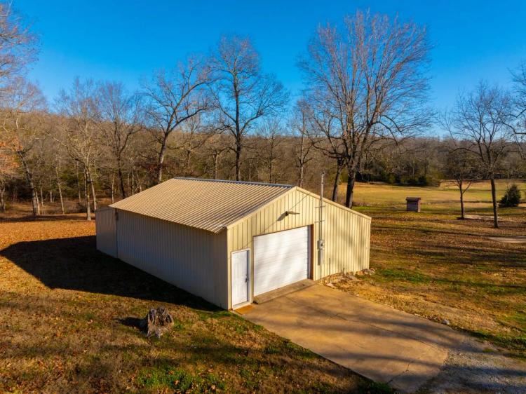 9 +/- Acres, Shop with living quarters, Highway 63/412 Frontage, Williford, AR