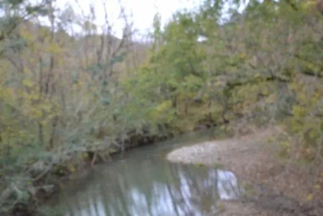 5.32 AC LEVEL OPEN PASTURE – OPEN HAY BARN – SHED