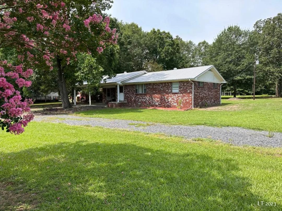 House on 6 acres with a pond